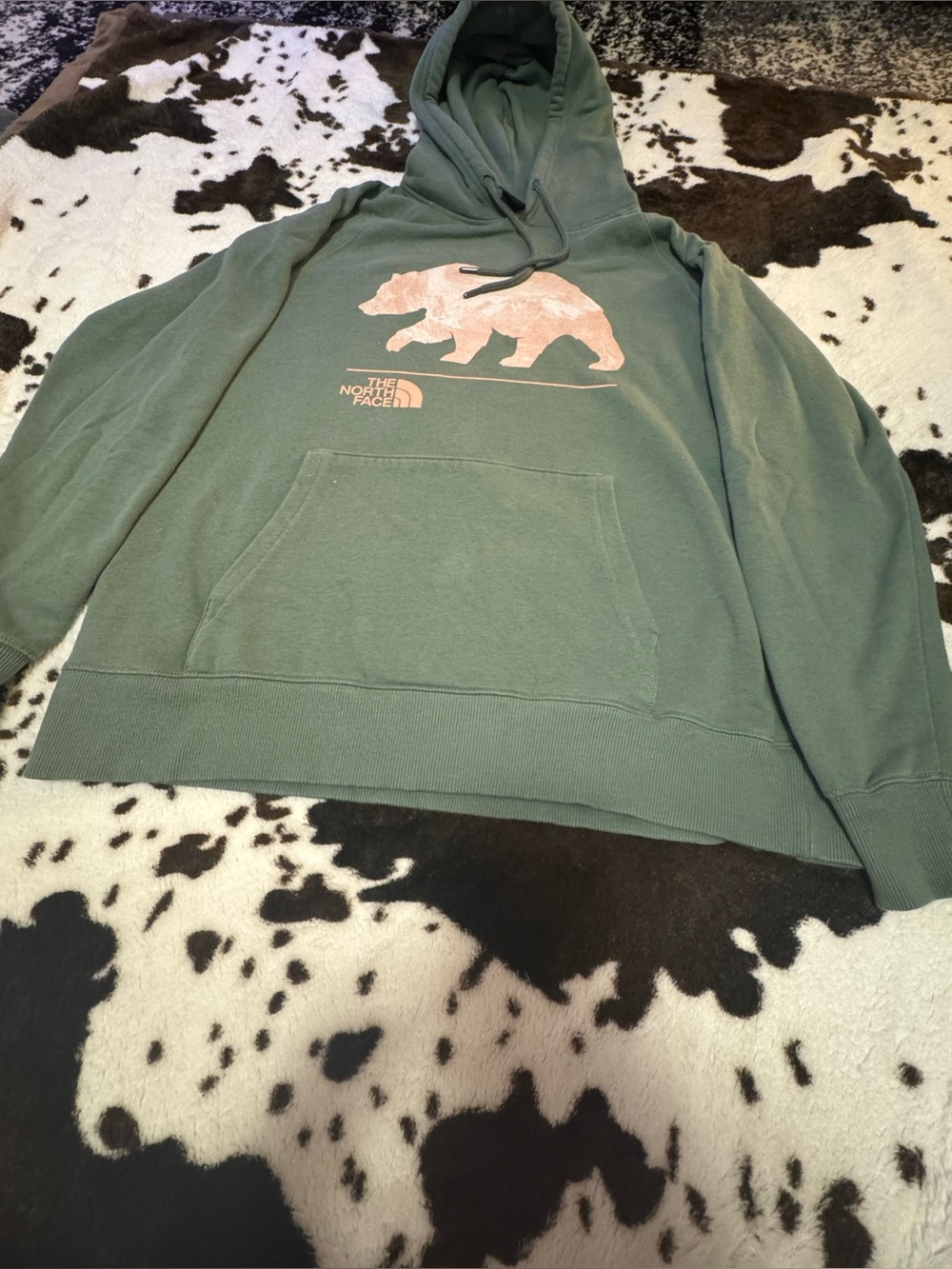 The North Face Green Hoodie with Pink Bear Design